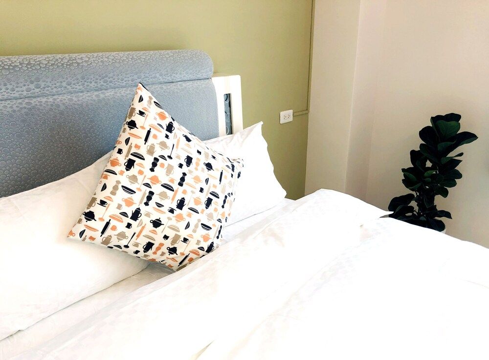 Deluxe Quadruple Room(Accept extra 1 person, charge TWD500 at front desk)