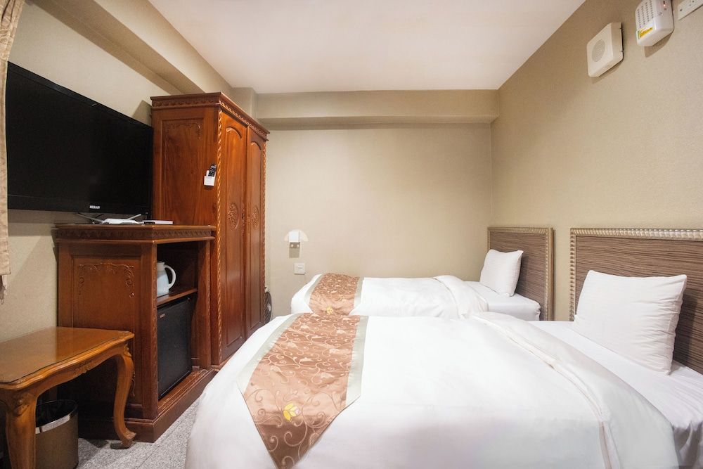 Mei Jia Mei Hotel Deluxe Twin Room