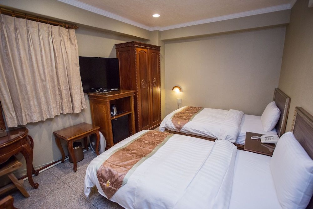 Mei Jia Mei Hotel Deluxe Twin Room 4