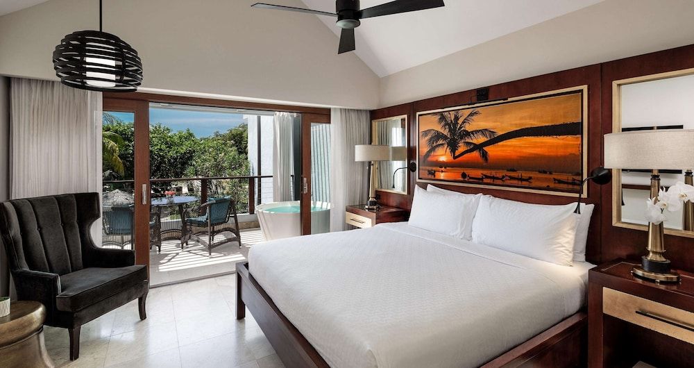 Longshore Beachfront Two-Story, One Bedroom Butler Villa Suite w/ Tranquility Soaking Tub