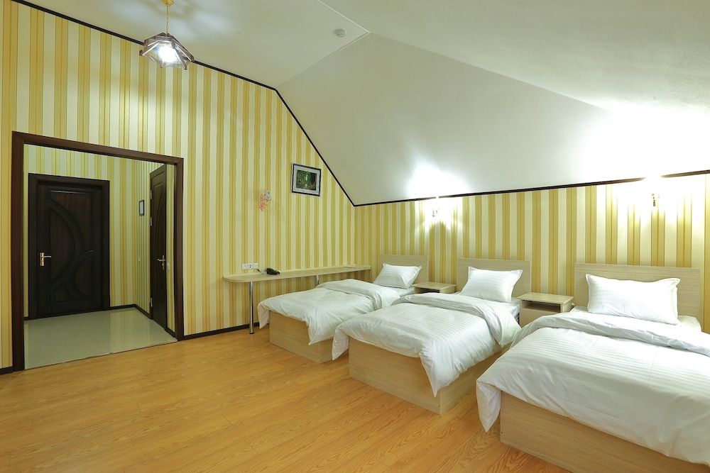 Deluxe Triple Room, City View
