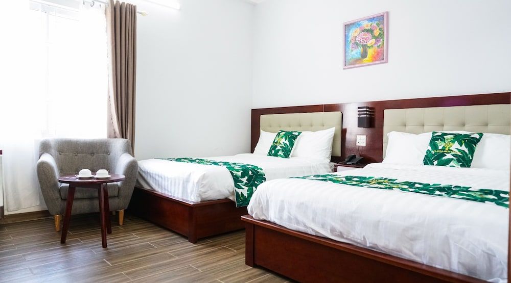 Grand Quadruple Room, 2 Queen Beds, City View