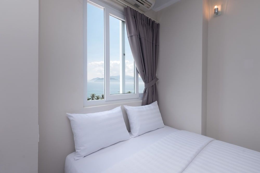 Superior Quadruple Room, 2 Double Beds, Partial Ocean View