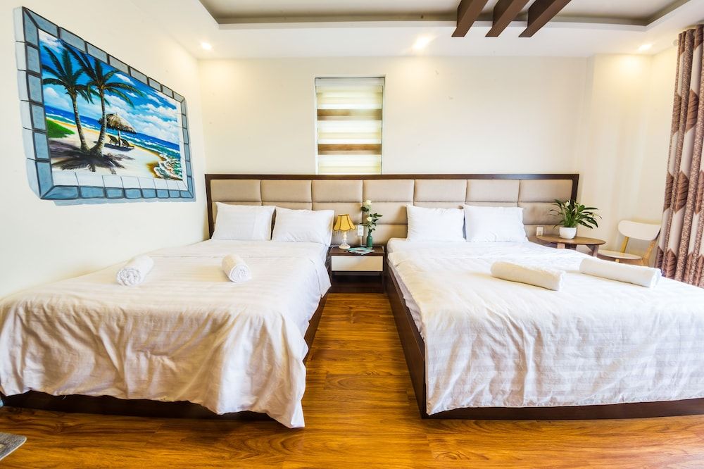 Superior Quadruple Room, 2 Queen Beds, Balcony, City View