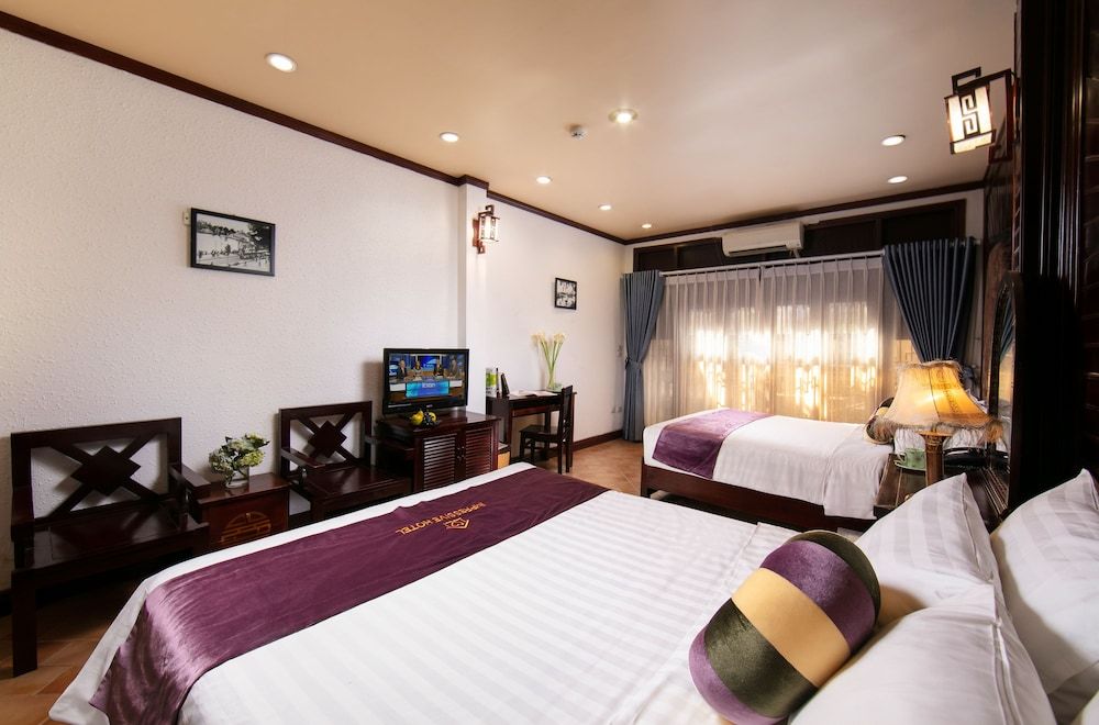 Impressive Boutique Hotel Deluxe Triple Room 10