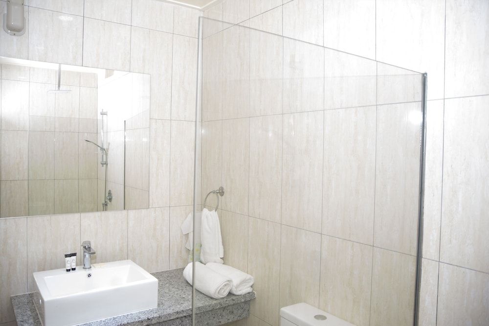 Samoana Boutique Hotel Deluxe Quadruple Room, 2 Queen Beds, Kitchen, Mountain View 6