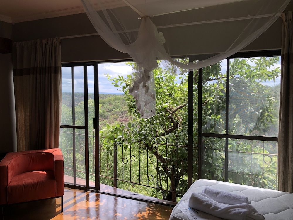 Leopards Rock Bush Boutique Executive Suite, Garden View 6