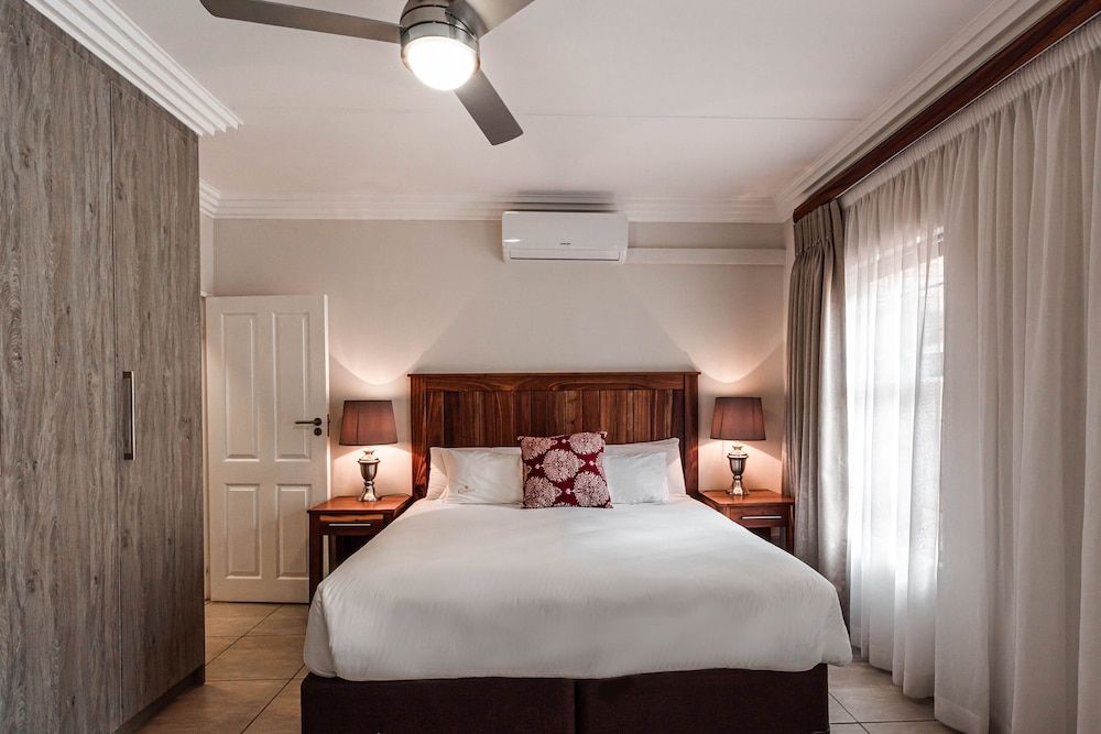 Camelot Guest House & Apartments Classic Apartment, 3 Bedrooms, Patio 2