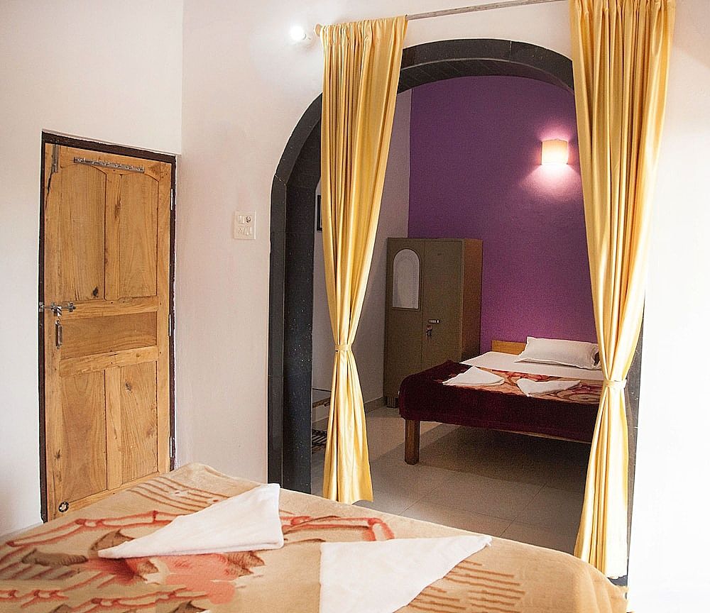 The Sunset Guest House Classic Quadruple Room, Balcony, Partial Ocean View