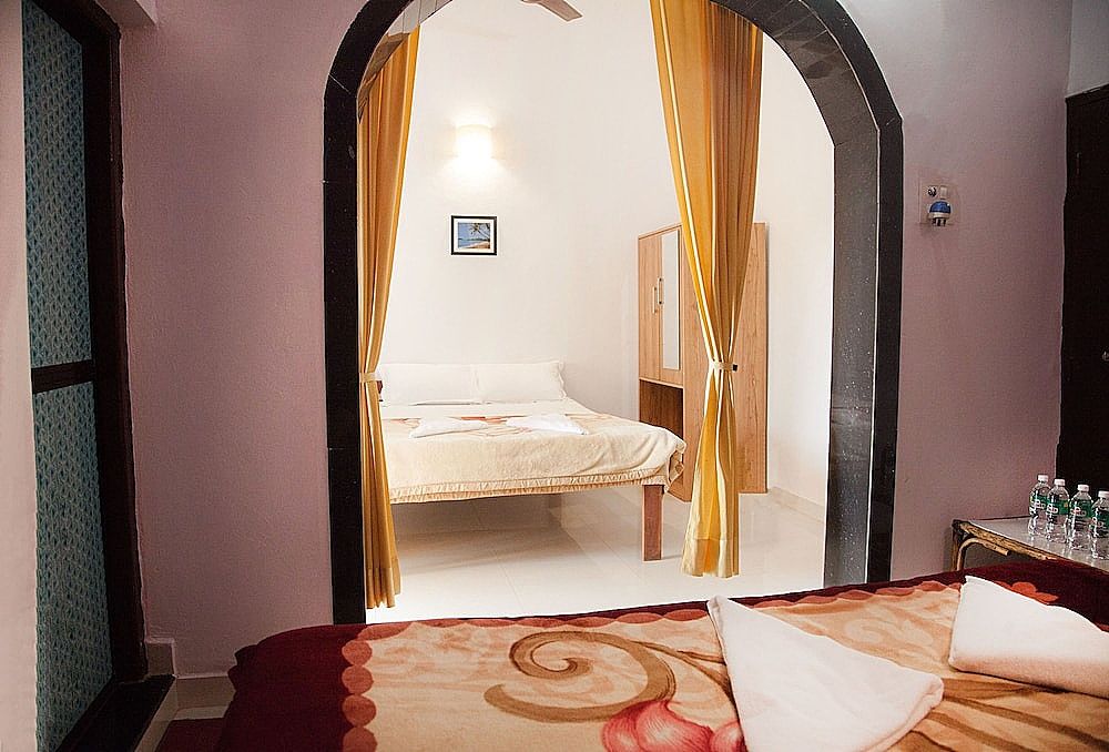 The Sunset Guest House Classic Quadruple Room, Balcony, Partial Ocean View 2