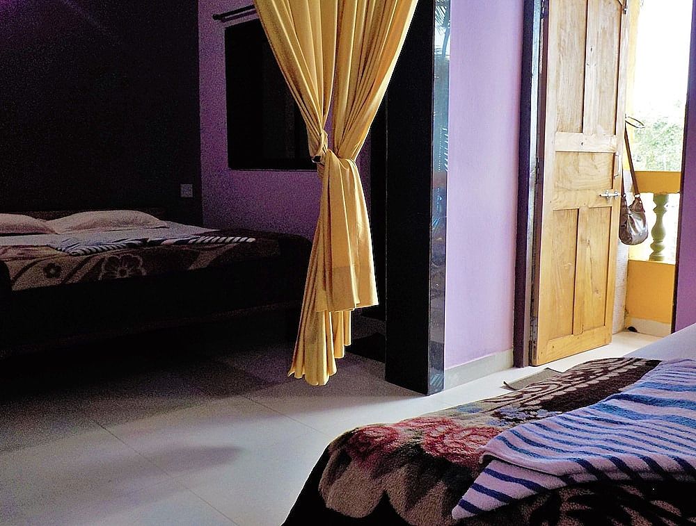 The Sunset Guest House Classic Quadruple Room, Balcony, Partial Ocean View 4