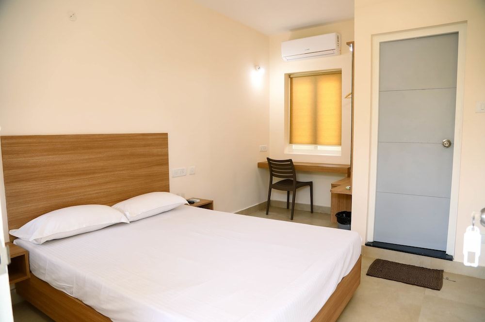 Oceanside Mahabalipuram Standard Queen Bed Room