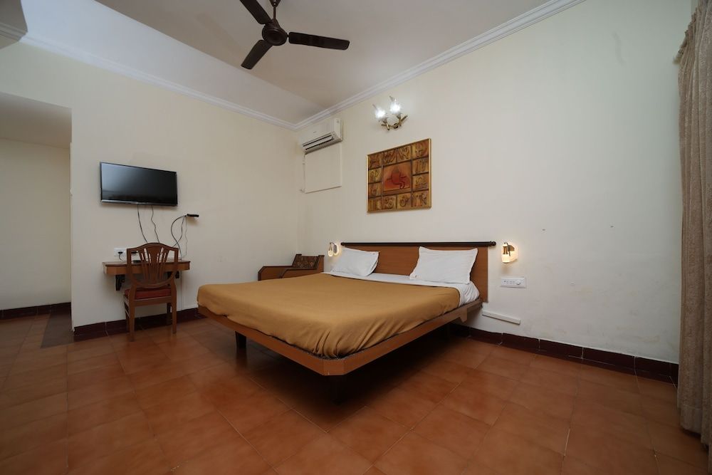 Deluxe Quadruple Room, 1 King Bed