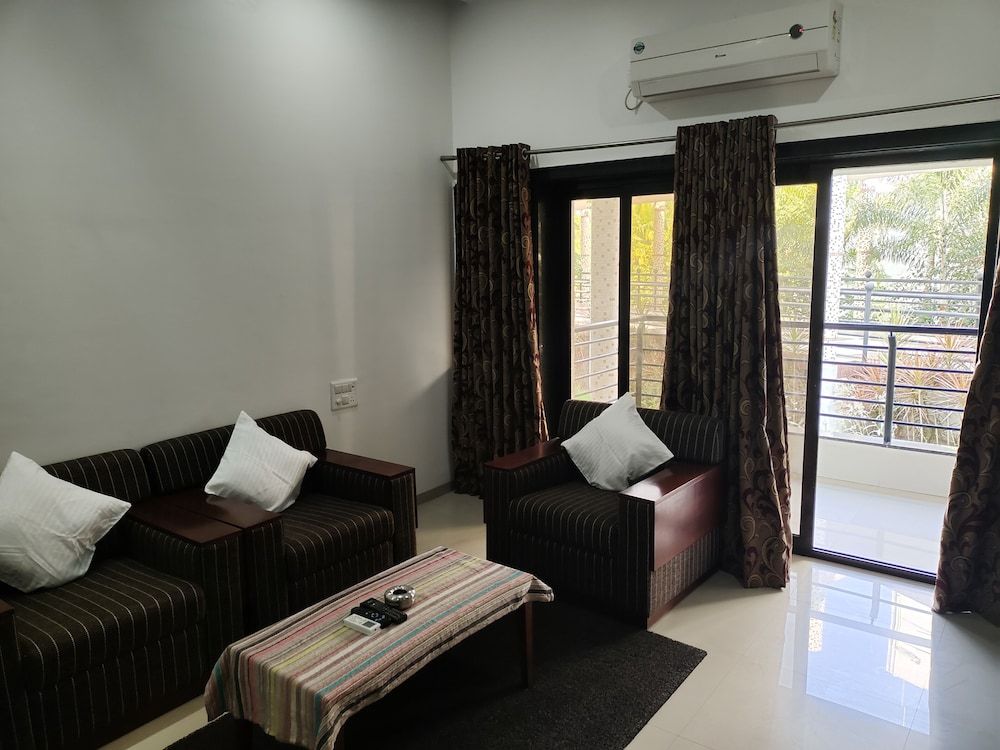 Sapphero Resorts A Unit Of Shri Sai Hospitality Comfort Double Room, 1 King Bed, Balcony, Garden View 10