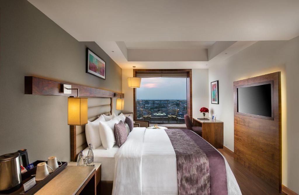 Nirvana Sarovar Portico Deluxe Double or Twin Room