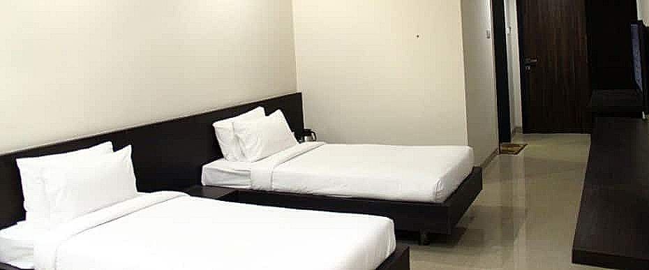 TGI Grand Nirvanaa Deluxe Room