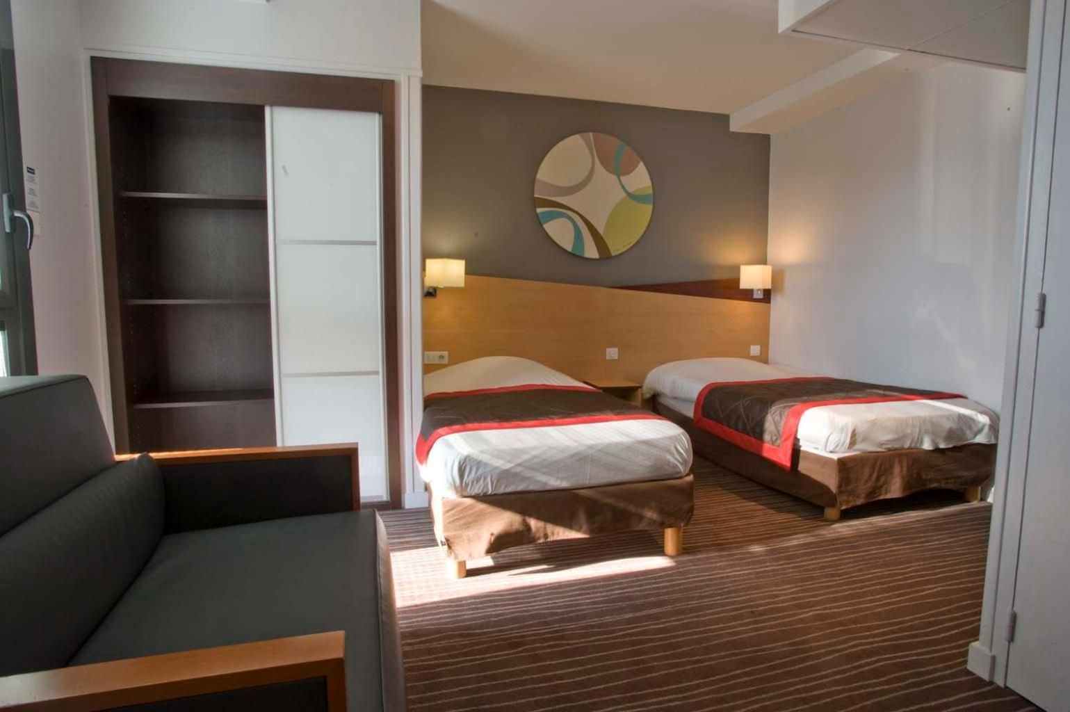 Standard Room - 2 Single Beds 1 sofa bed