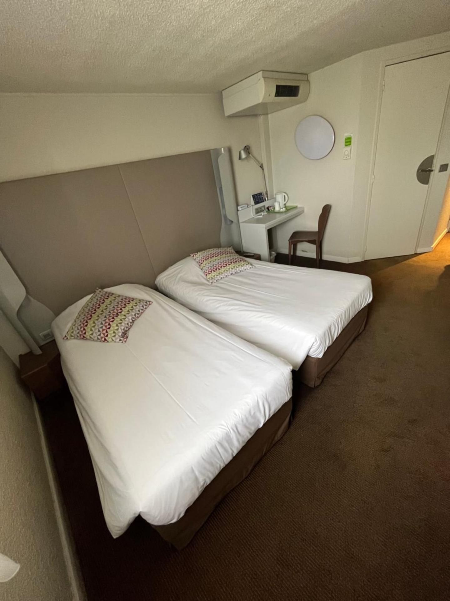 Standard Queen Room with Two Single Beds