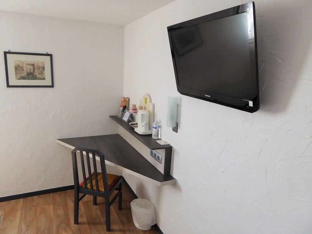 Hôtel Le Relais Triple Room 6