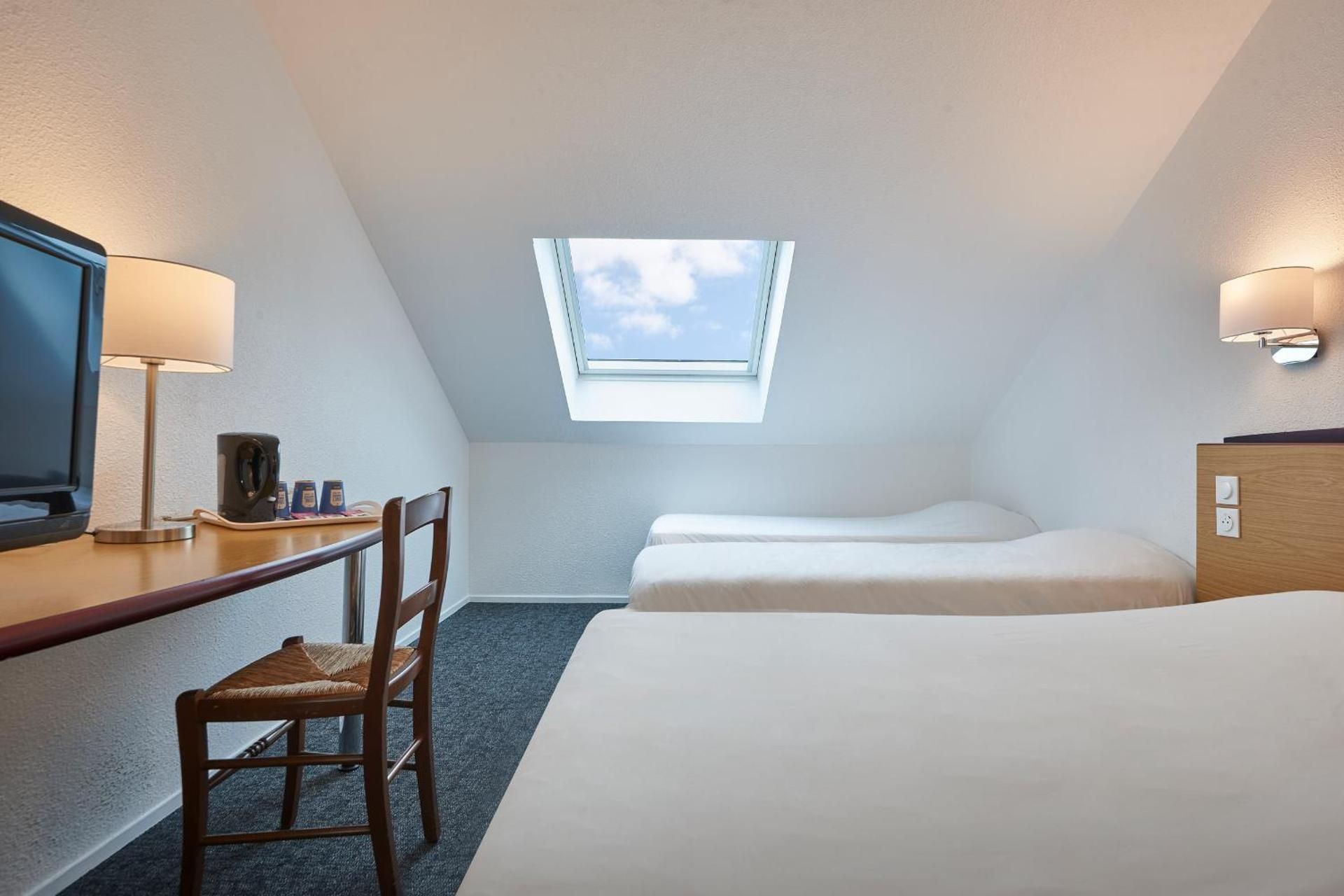 Triple Room (1 Double Bed + 1 Single Bed)