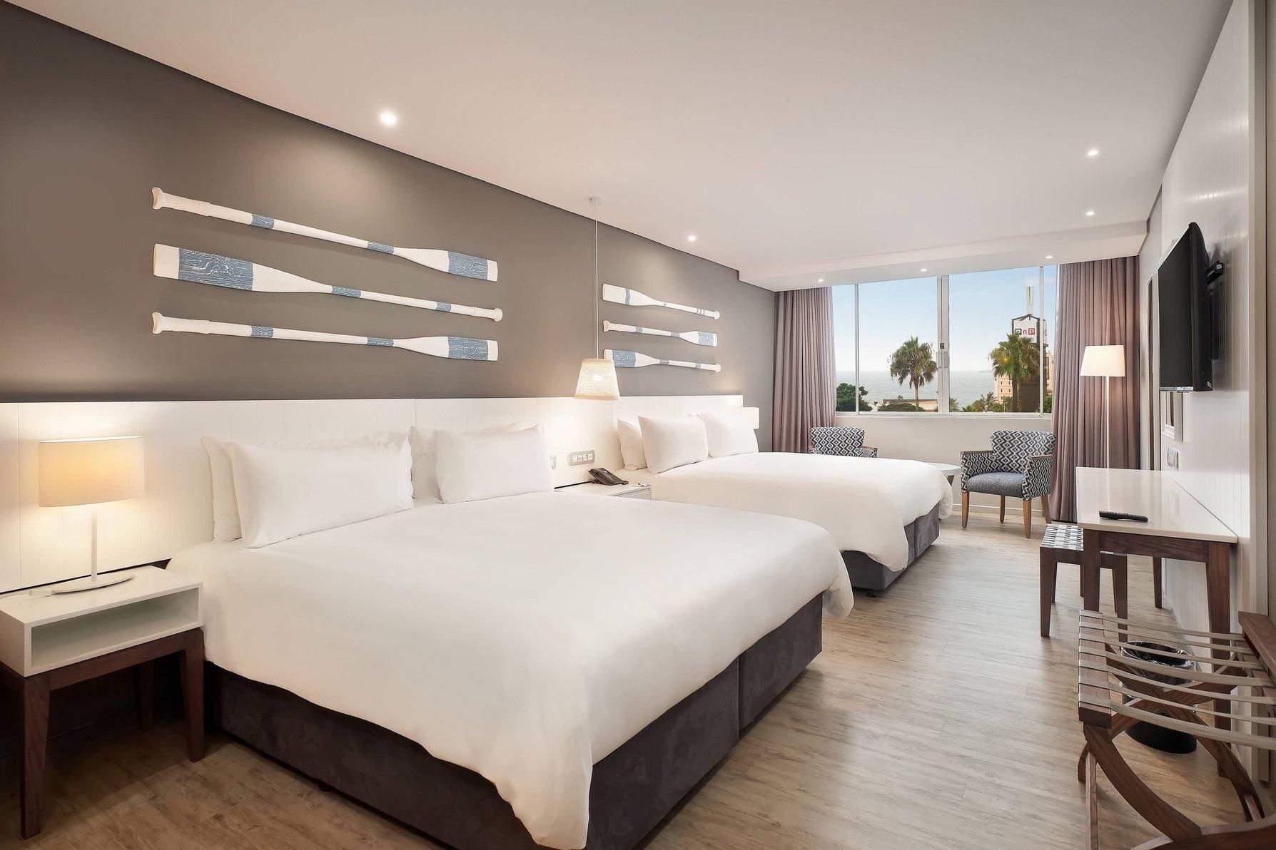 Larger Guest room, 1 King, Partial ocean view