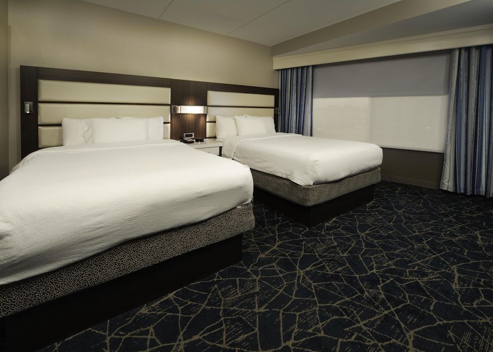 2 Queen Bed 1 Bedroom Suite with Bath Tub & Pullout Sofa