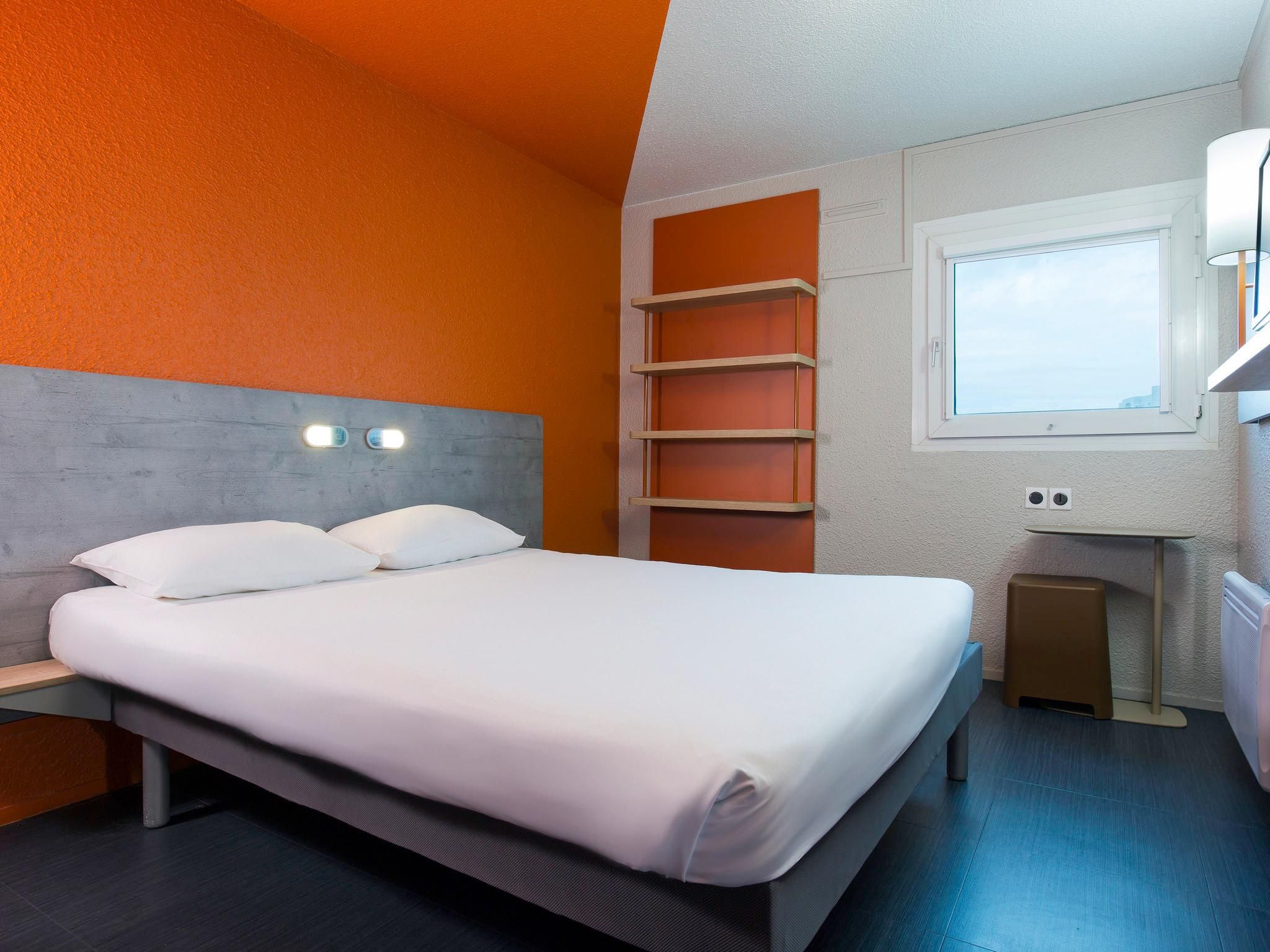 Classic Room With A Double Bed And A Single Bunk Bed