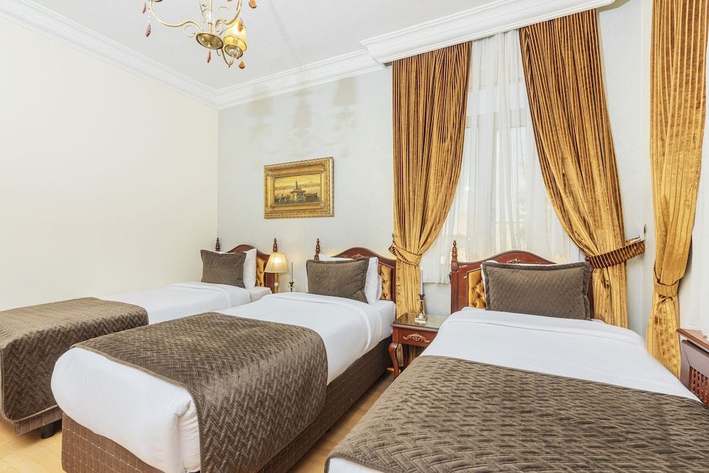 Deluxe Triple Room