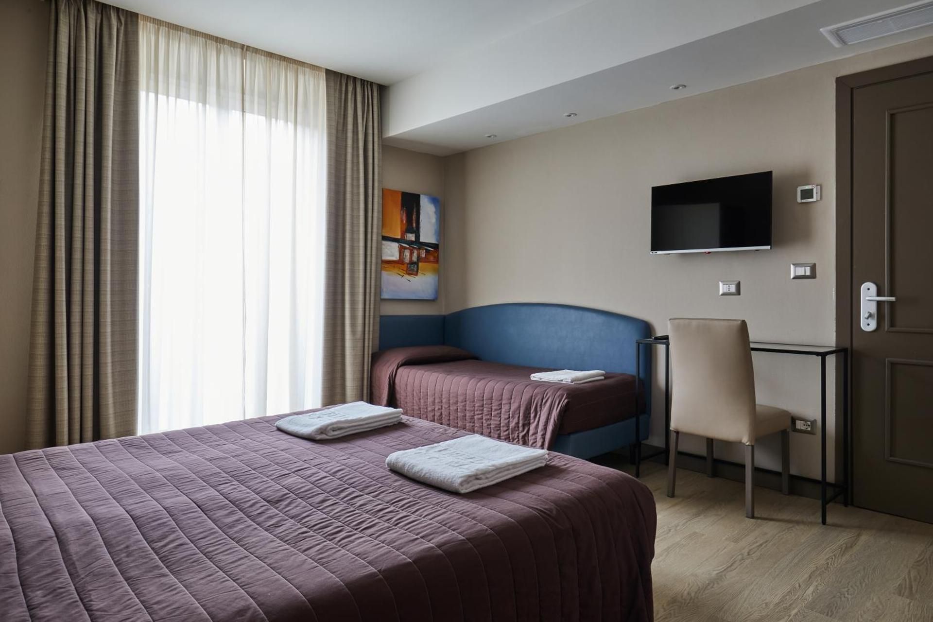 Deluxe Triple Room