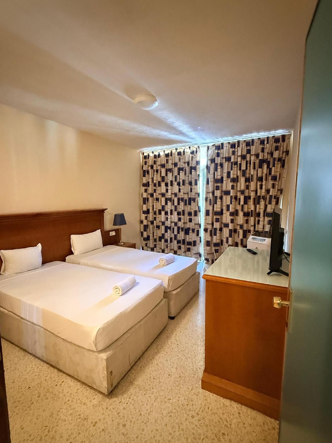 Quadruple Room with Balcony