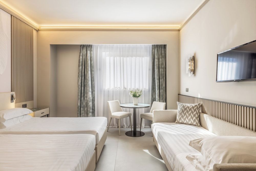 Abacus Hotel Exclusive Triple Room