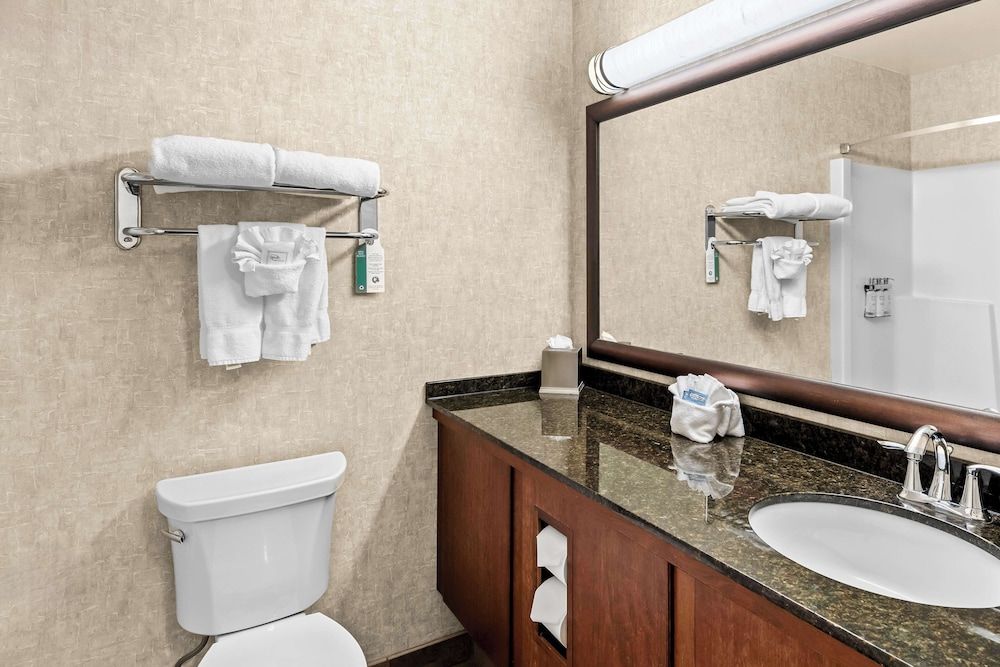 Heartland Inn & Suites, SureStay Collection by Best Western Standard Room, 1 King Bed, Refrigerator & Microwave, Courtyard Area 2