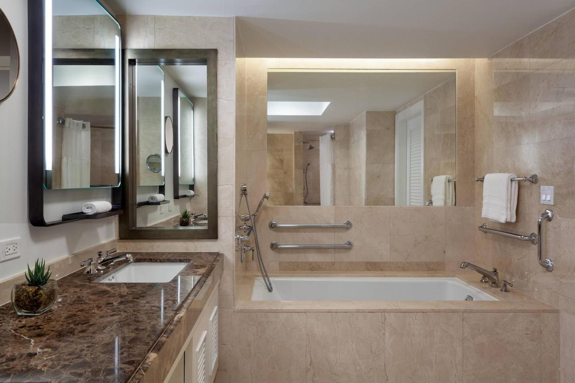 Queen Room with Two Queen Beds, Balcony, Partial Ocean View and Mobility Accessible Roll-In Shower