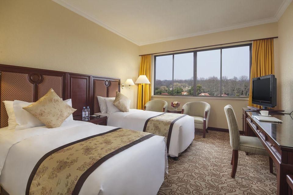 undefined Jin Jiang Cypress Hotel 4