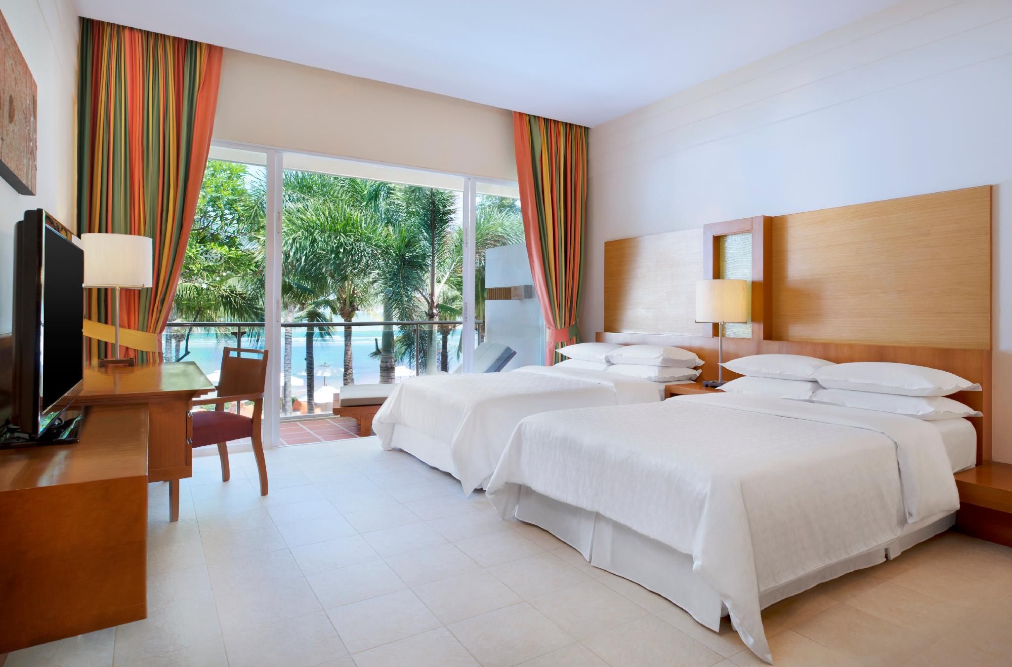 guest room, 2 double, sofa bed, oceanfront view