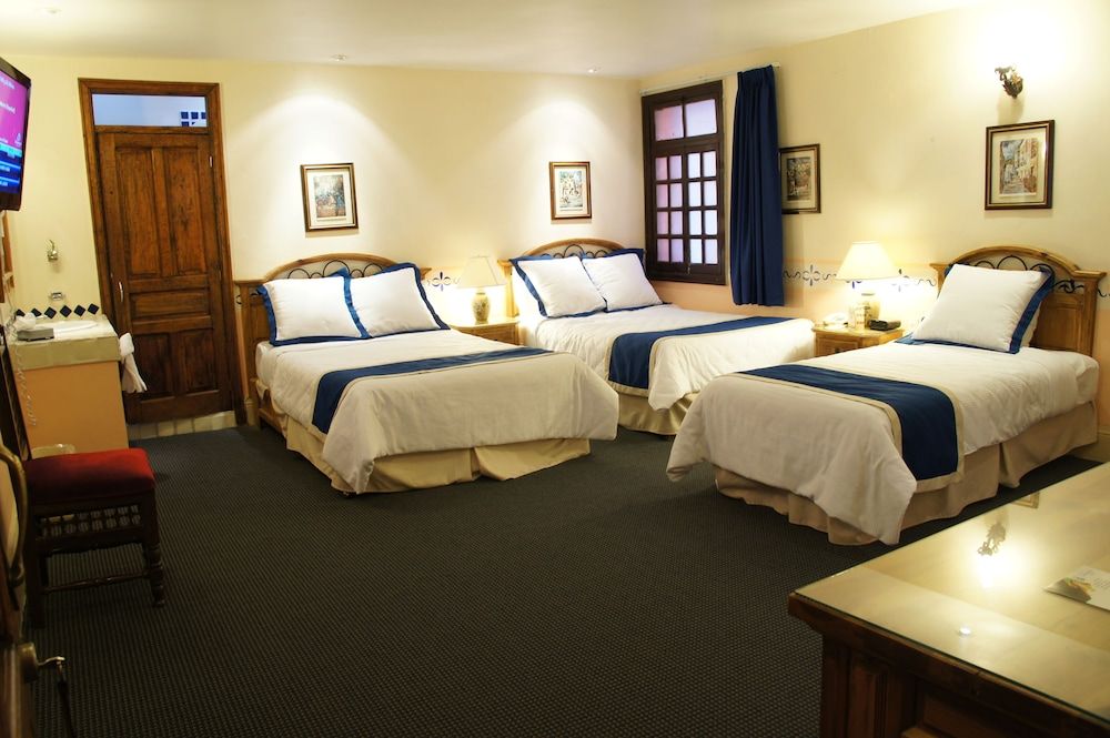 Hotel Posada Santa Fe Comfort Quadruple Room, 2 Double Beds