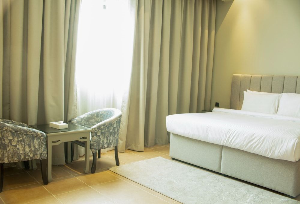 Capital O 111 Infinity Suites Twin Room 4