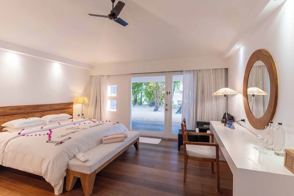 Diamonds Athuruga Maldives Resort & Spa Beach Front Villa