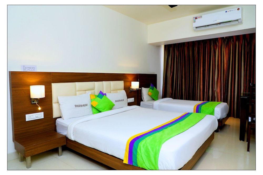 Treebo Trend Staycation Holiday Premium Room, 1 Queen Bed, Non Smoking 10