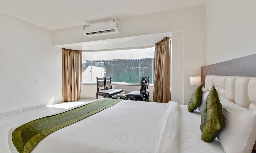 Treebo Trend Staycation Holiday Deluxe Room, 1 Queen Bed, Non Smoking 7