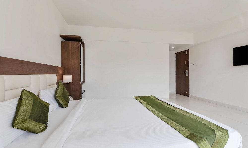 Treebo Trend Staycation Holiday Deluxe Room, 1 Queen Bed, Non Smoking 6