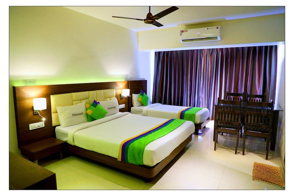 Treebo Trend Staycation Holiday Premium Room, 1 Queen Bed, Non Smoking 9