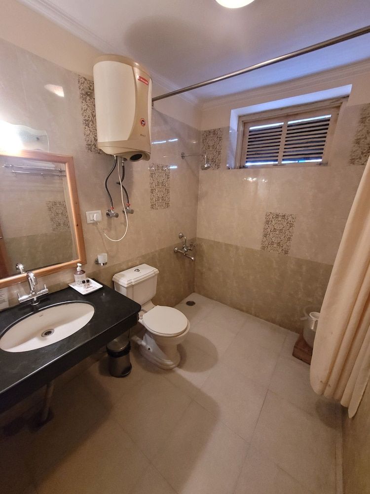 Gezellig Inn - Golden Apple | Cosy Rooms Deluxe Room 4