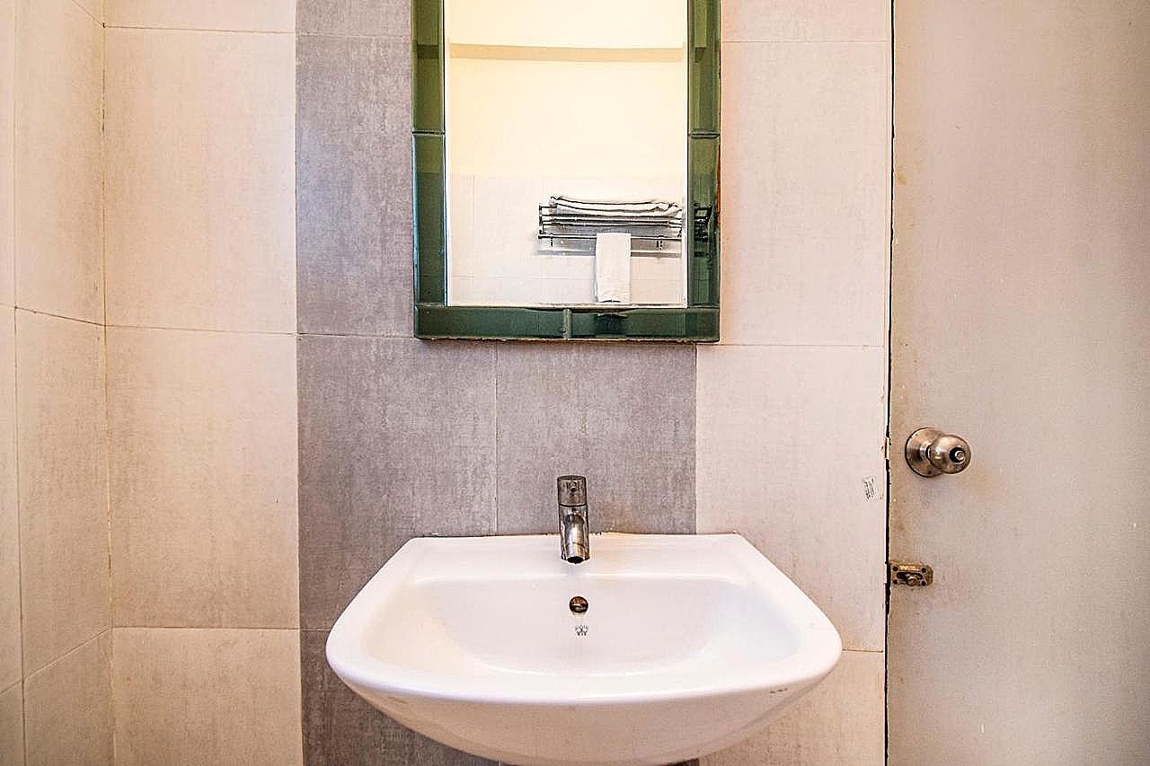 FabHotel Kumar Deluxe Room 4