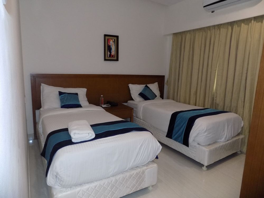 Mint Magna Suites Executive Twin Room, 2 Twin Beds, Non Smoking, City View 6