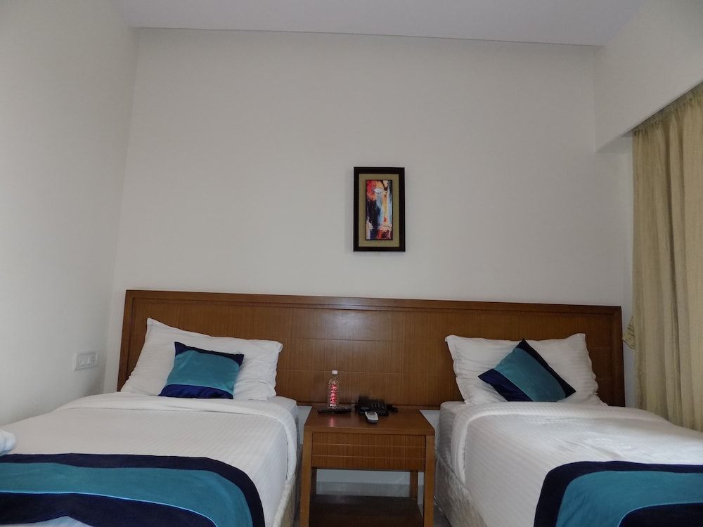 Mint Magna Suites Executive Twin Room, 2 Twin Beds, Non Smoking, City View 5