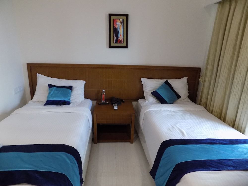 Mint Magna Suites Executive Twin Room, 2 Twin Beds, Non Smoking, City View 7