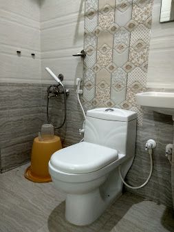 Mapletree Inn Deluxe Room Non AC 5