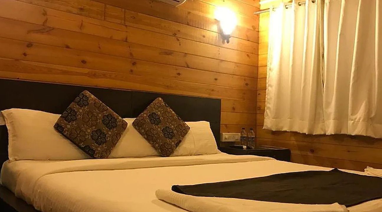 Maitree Resort Deluxe Wooden Cottage 3