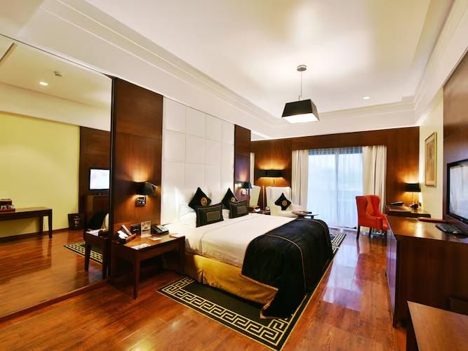 Della Resorts Adventure Resort King Bed Room